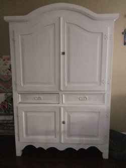 White chalk painted storage armoire