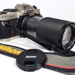 Nikon FM10 35mm SLR Camera w/ 75-200mm Lens & Nikon Strap - WORKS GREAT