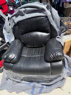 Excellent condition black leather reclining chair