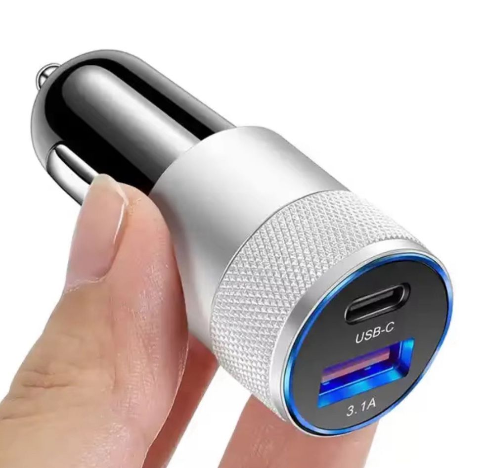 Compact universal car charger with dual USB and Power Delivery ports, offering fast charging and safety protections.