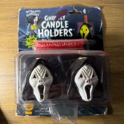 Set of ghostly candle holders with four red candles. Perfect for spooky decor.  From 1998 Brand New! Great for Halloween! MAKE AN OFFER !!! 