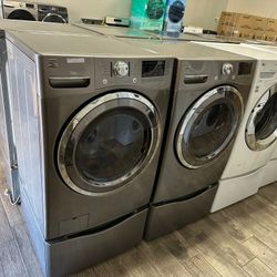 Kenmore elite stainless steel Frontload washer and dryer set electric with warranty