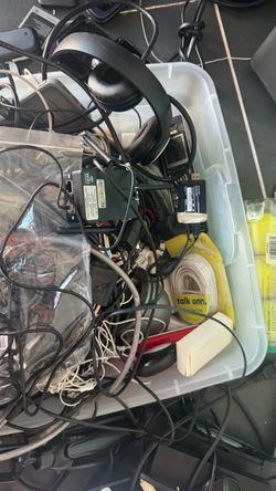 Box of electronics and cords and cell phones all untested