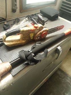 Combination long reach/hand held cordless lithium Powered chainsaw 12 ft.reach , quick charger