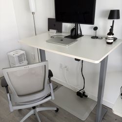 Office Standing Desk and Ergonomic Office Chair 