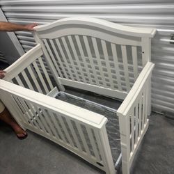 White Solid wood baby crib.  Have complete set of instructions to put together.. Bonavita brand $100