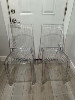 2 plastic chairs