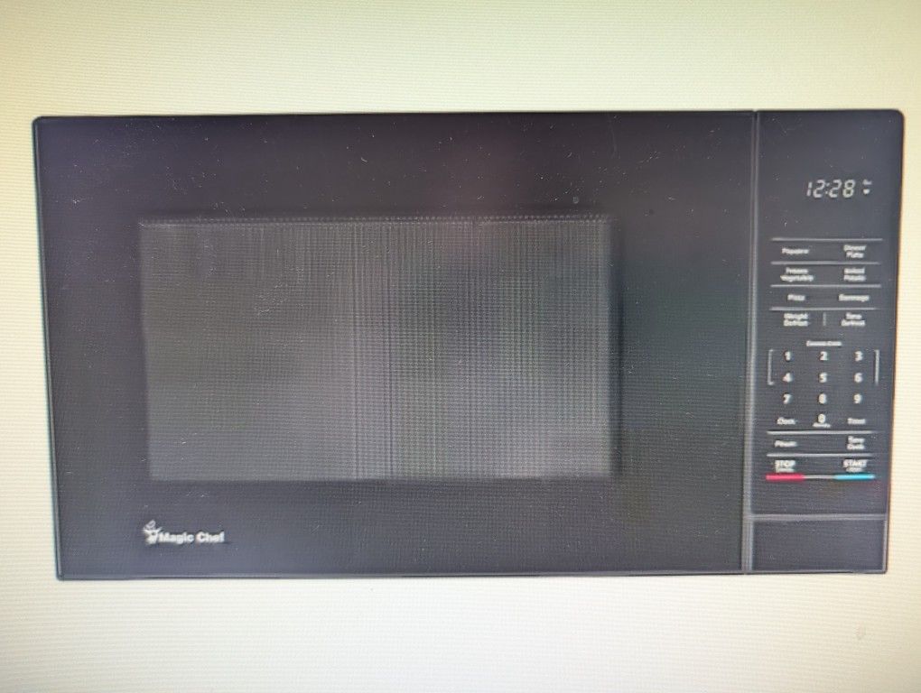 Brand New 1.1 Cu Ft Countertop Microwave In Stainless steel With Digital Touch