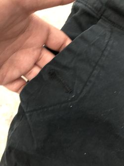 Black low rise flare jeans with button fly