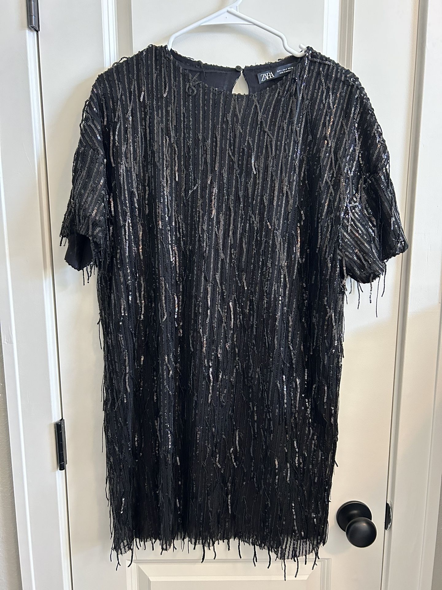 Woman’s Zara black sequins dress. Size small.