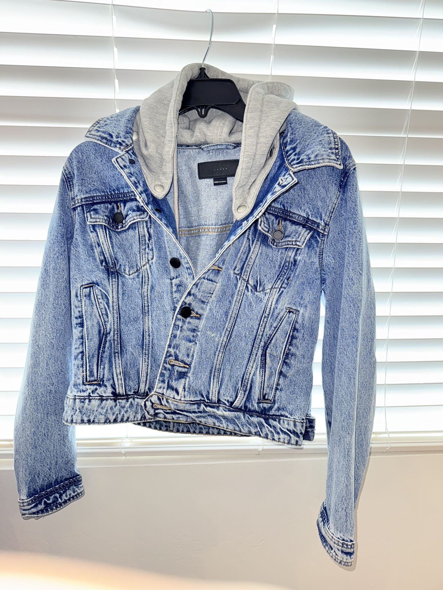 Blue BlankNYC 2010’s classic style denim jacket with hoodie made with 90% Cotton Hood is detachable.