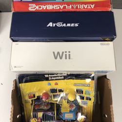 2 Boxes Of Old Video Game Stuff 