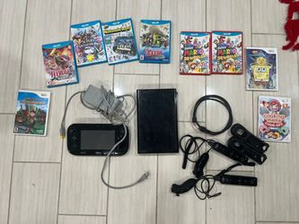 Nintendo Wii U console with pad, 2 controllers and games