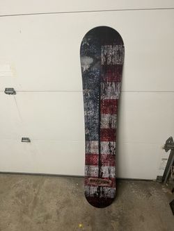 Camp Seven Drifter snowboard featuring a rustic, weathered American flag graphic in New Condition