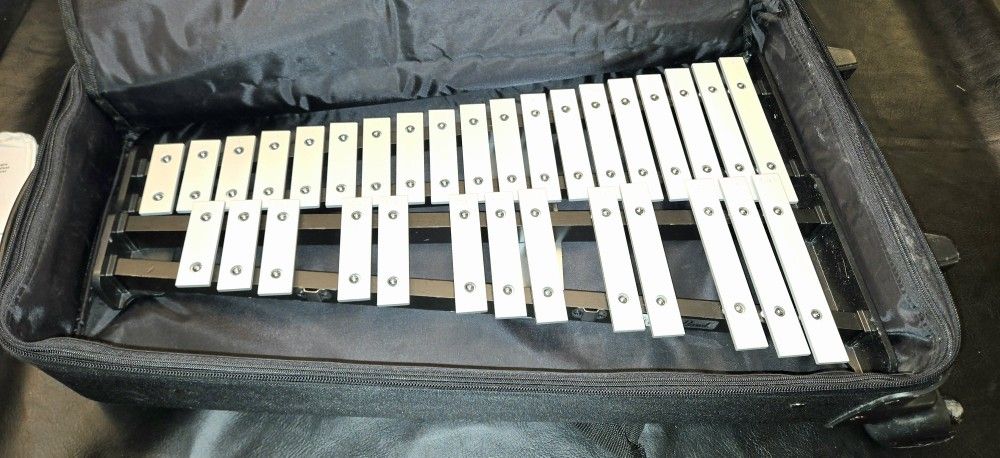 Pearl  Snare Drum and Bell Kit w/ Hardware, practice pad, book and Rolling Case.