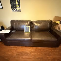 Two Leather Sofa (Almost New)