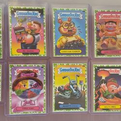 Lot of 10 Topps Garbage Pail Kids Booger Green Parallel cards.