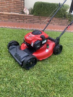 21 inch troy Bilt TB 200 push lawnmower starts right up ready to use no bag