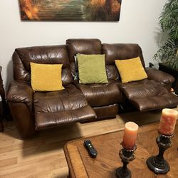 Donating leather Sofa/recliner 