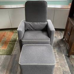 Grey upholstery with white piping. 