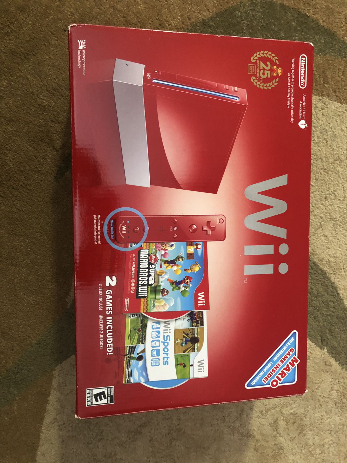 Wii with 2 games (Super Mario, Wii Sports), 2 controllers