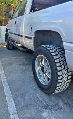 20" 8-Lug Wheels & 35x12.50R20 Gladiator QR900 M/T Tires – $700