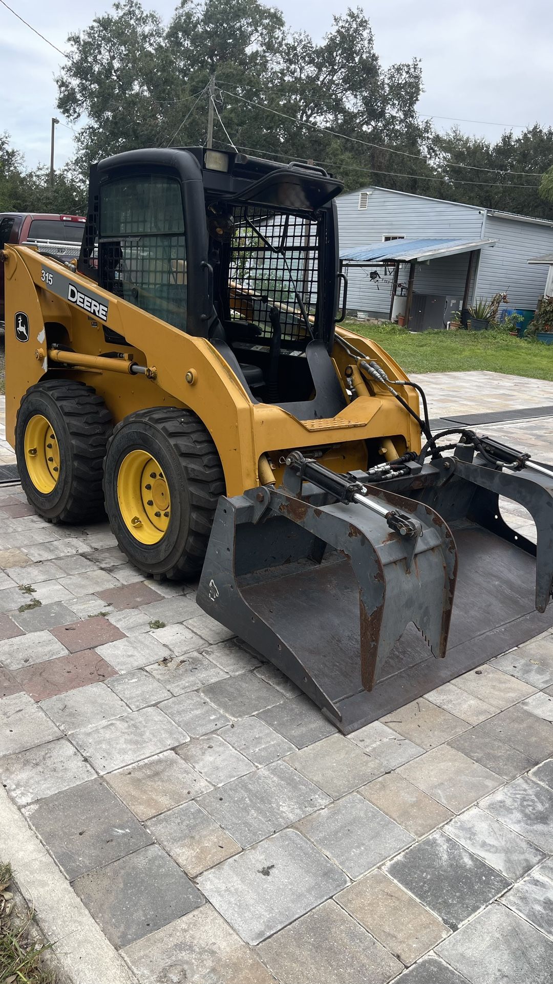 315 John Deere Skid steer