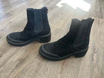 Women’s black zip boots size 9.5