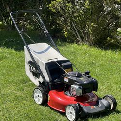 Toro Lawn Mower That Takes Gas and Moves On Its Own 