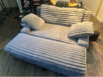 Thomasville oversized chair with storage ottoman