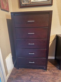 Tall dark wood 5 drawer dresser