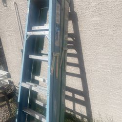two 6’ fiberglass ladders