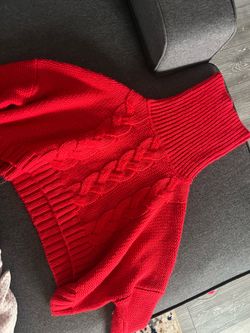 Red turtleneck sweater