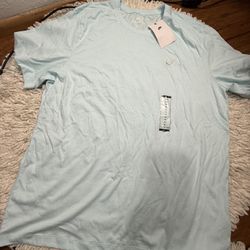 Brand new Men’s Nike Club T-shirt in light blue XL on tag