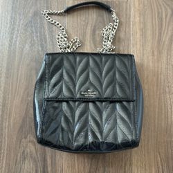 Kate Spade New York black patent leather backpack