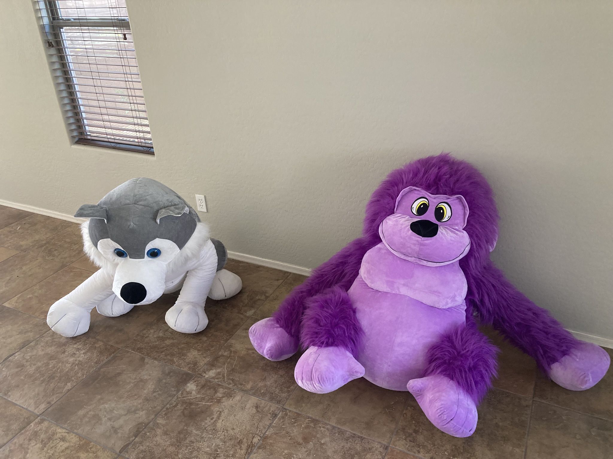 Giant Stuffed Animals. Monkey And A Wolf. 