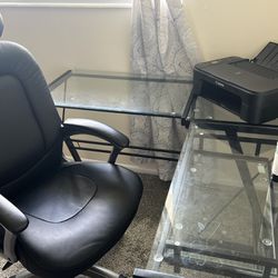 Glass Table With A Leather Arm Chair 