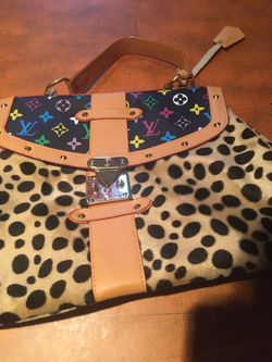 Nice Purse/ Handbag. Cheetah Print. Tan leather inside