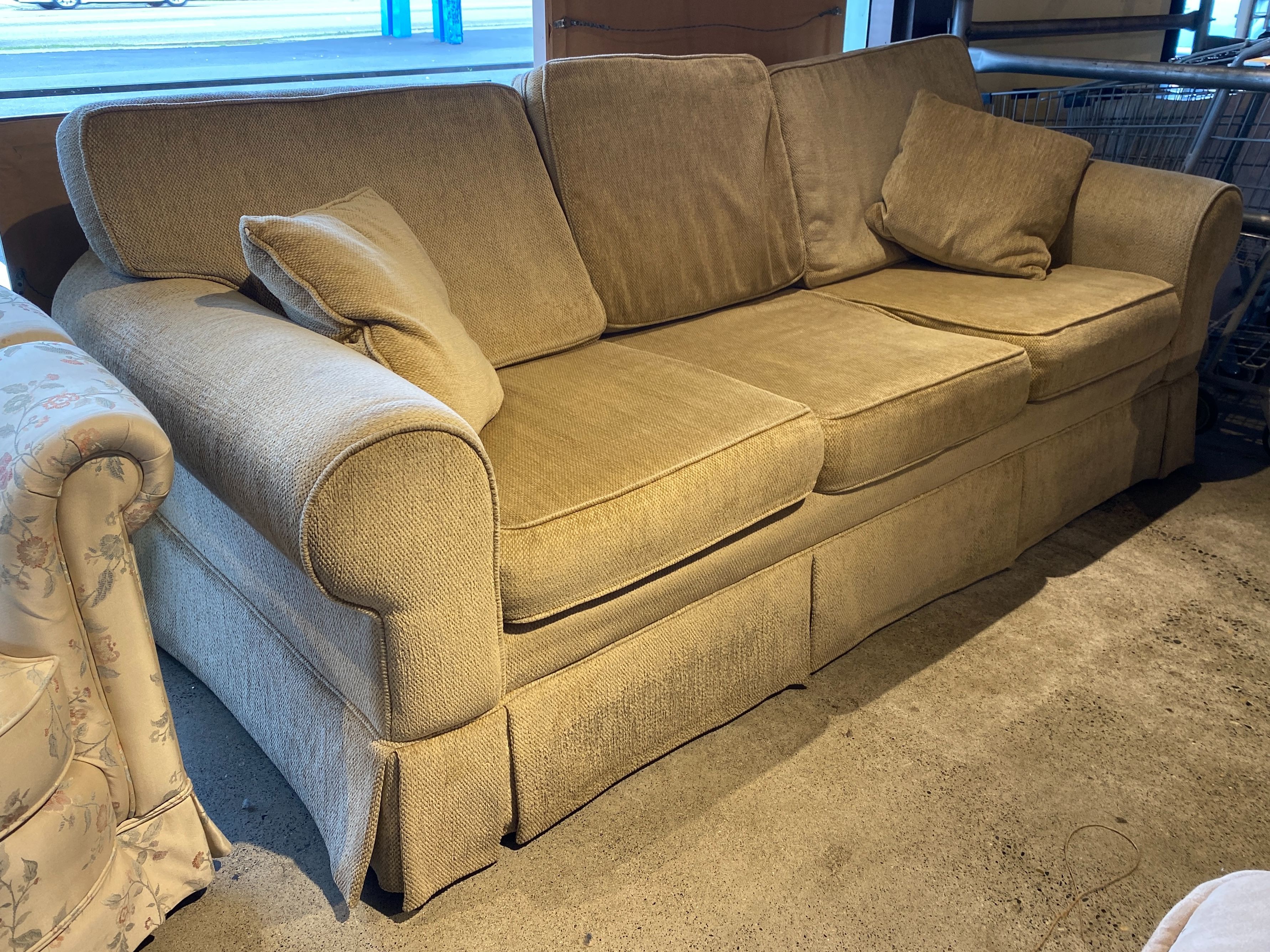 Modest Skirted 3-Seater Sofa w/ Throw Pillows