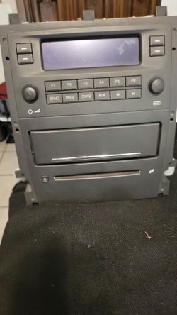 2005 Cadillac STS factory Radio With CD Player.