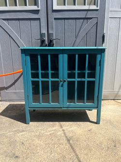 Turquoise Cabinet with Glass Doors