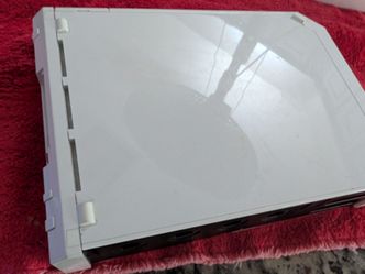Wii console working but game stuck on the console