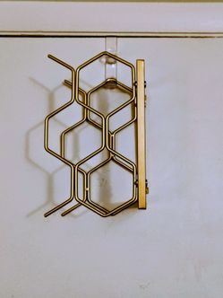 Gold metal wine rack