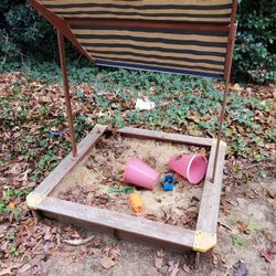 Sand Pit, Buckets And Shovels