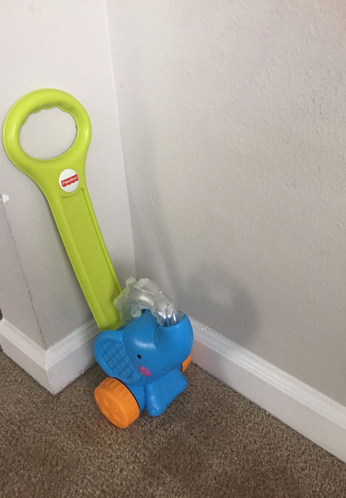 Fisher Price. Pop'n push elephant