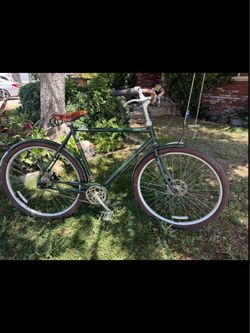 Raleigh Tourist classic city bike with a brown  leather saddle seat in great shape