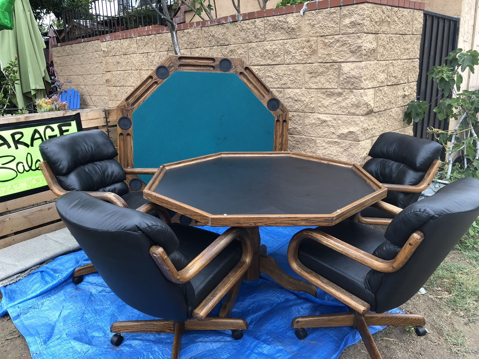 Poker and dining table combo! 4 rocking, swivel black leather chairs