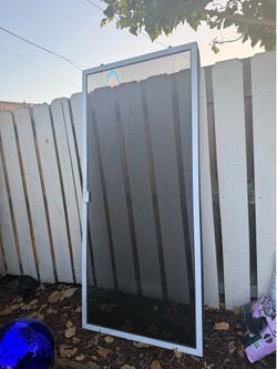 Perfect condition screen door for sliding  door DOG PROOF MESH