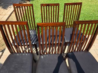 6 dark wood and leatherette dining table chairs