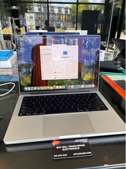 MacBook Pro 14” M2 Pro 16GB Ram 512SSD! 90 Day warranty! We offer financing.